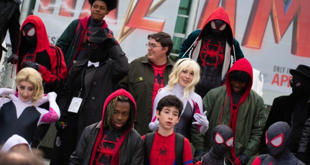 about a dozen Spider-man Copsayers pose for photos at a meet up at Wondercon 2019