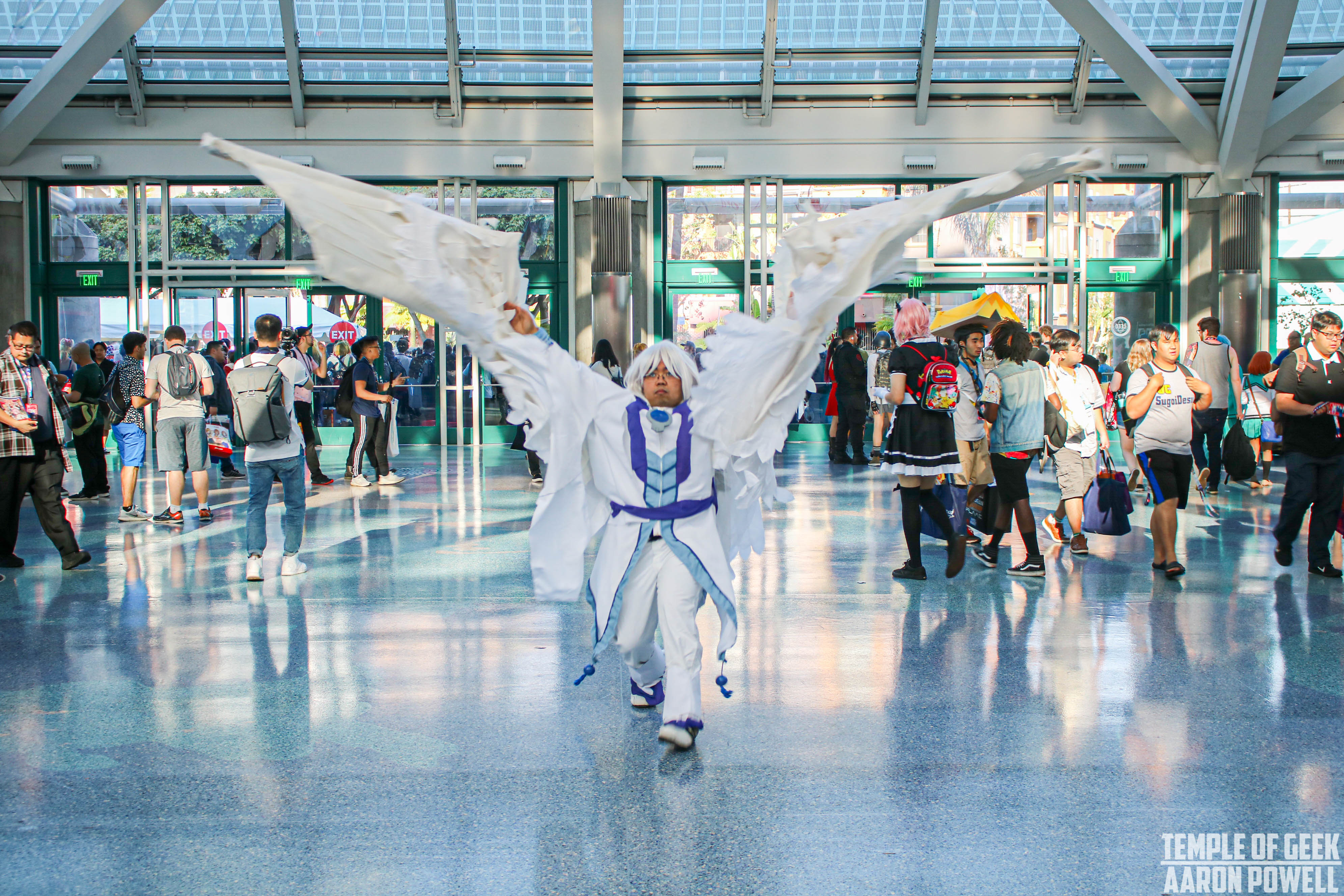 Anime cosplay walking through the lobby of the Los Angeles Convention Center at Anime Expo 2019.