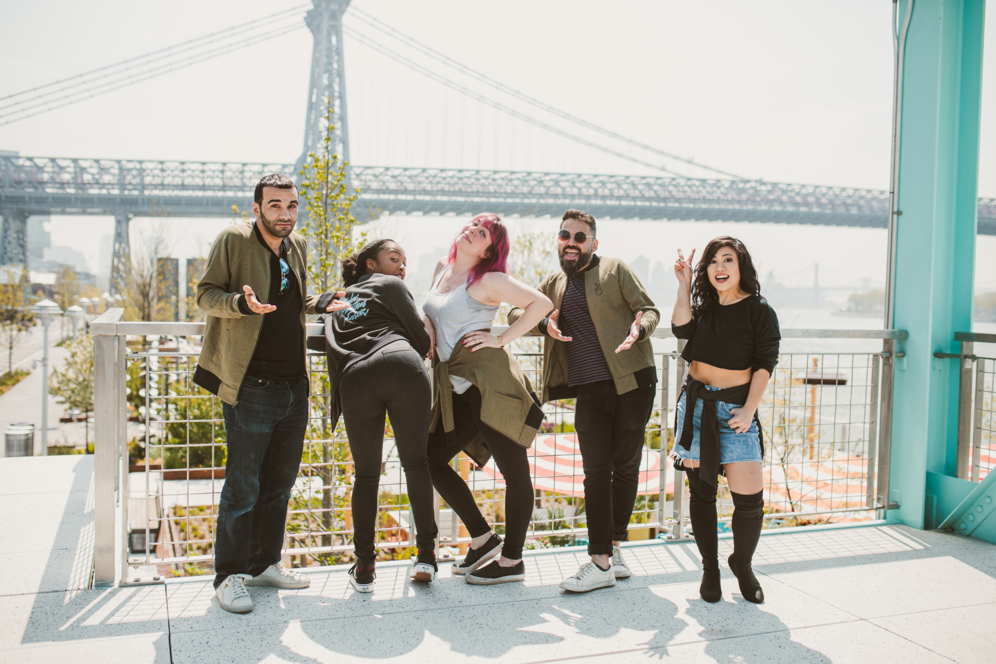 Photo shows five models in urban New York city wearing bomber jackets from Jordan's clothing company