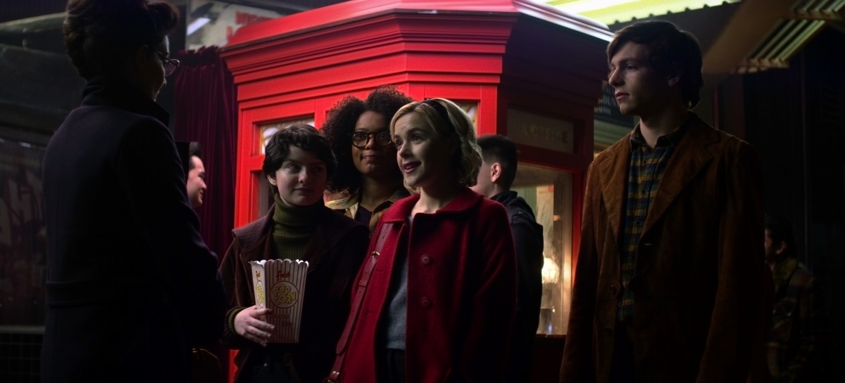 Sabrina Spellman and her friends Harvey, Rosalind and Susie meet their teacher Ms. Wardwell after the movies