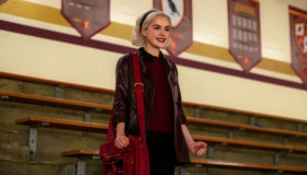 sabrina spellman in school during a basketball game