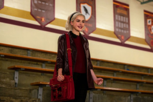 sabrina spellman in school during a basketball game