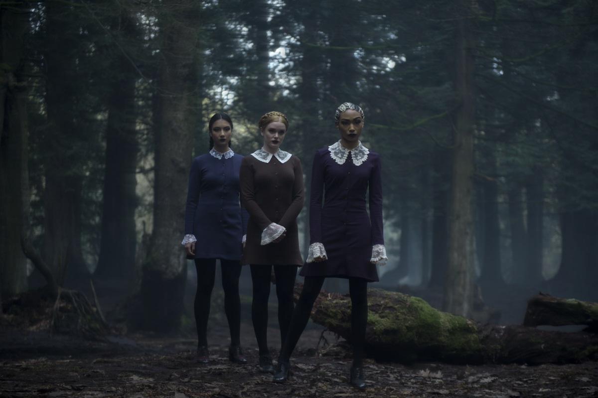 Agatha, Prudence and Dorcas standing in the woods