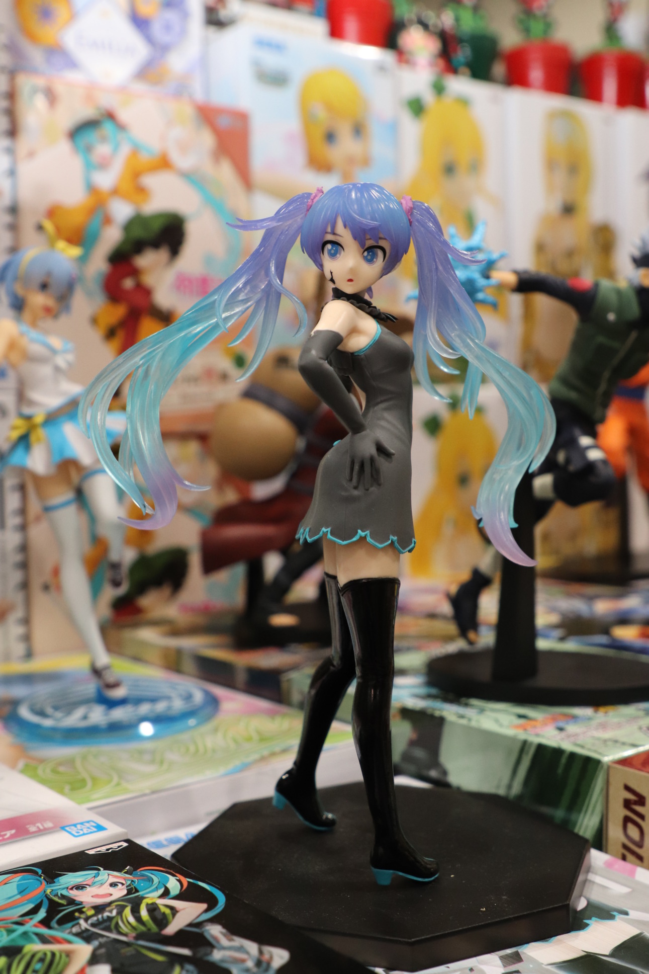 Photo of a collectible anime figure on display at a booth