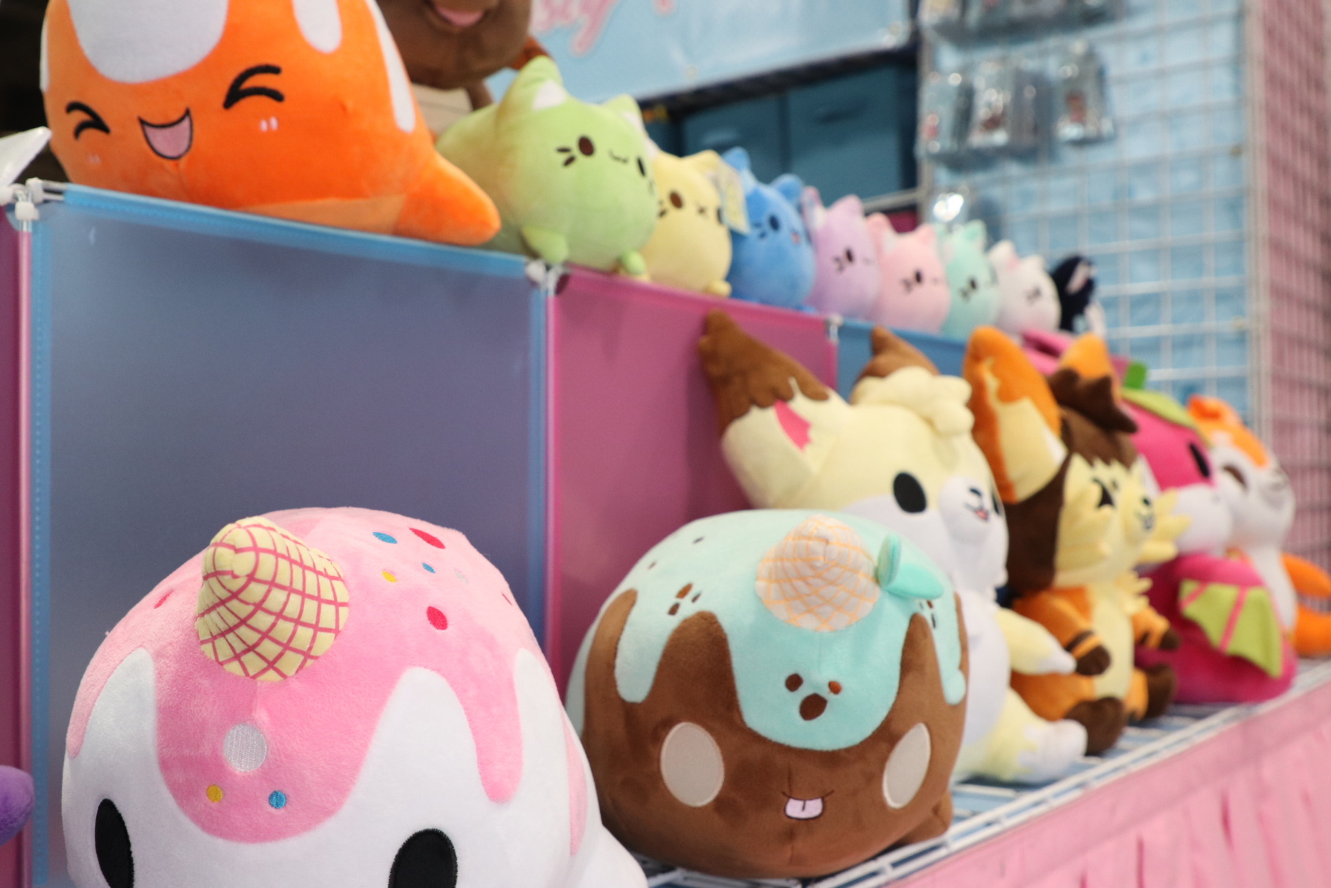 adorable plush toys at a vendor booth