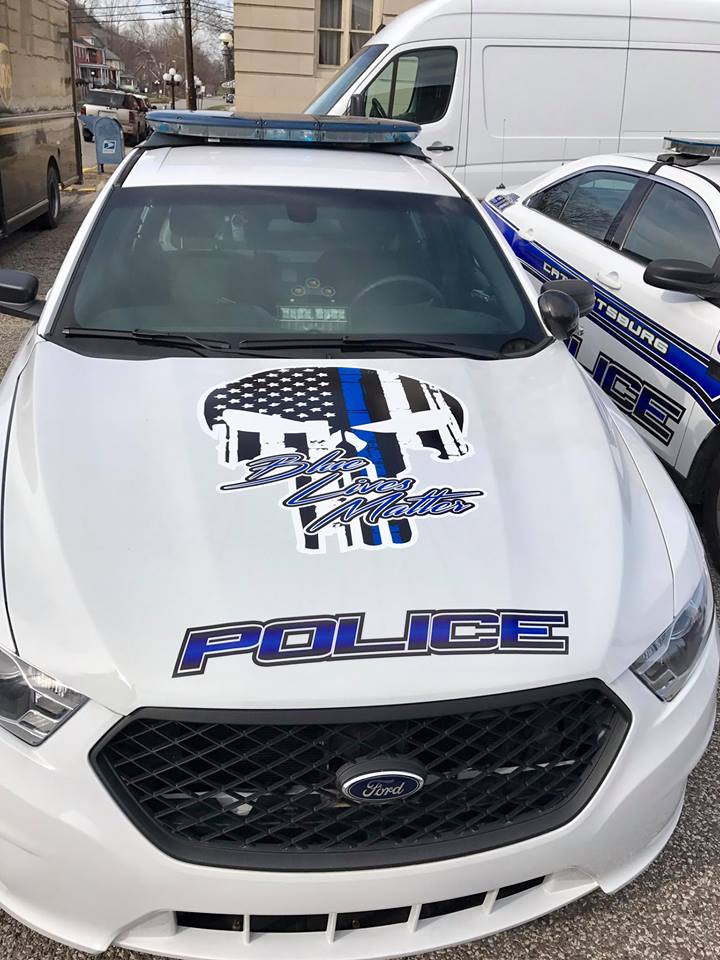 The Catlettsburg Police Department Police Cars decorated with Punisher Logo and Blue Lives Matter Logo.