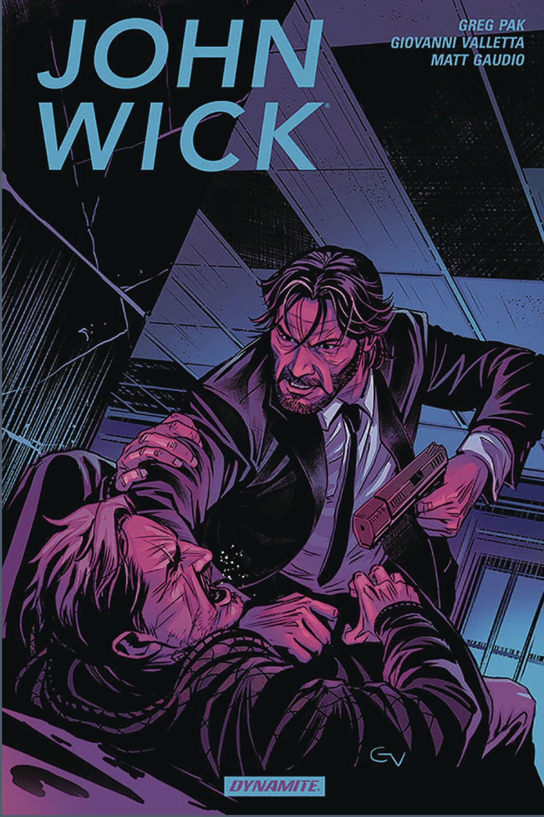 Cover of the John Wick Comic shows John Wick wearing a suit on his knees hoovering over a man on the floor. The man is in distress and John Eich is holding him down by his chest with one arm while pointing a gun at him with his free hand. 