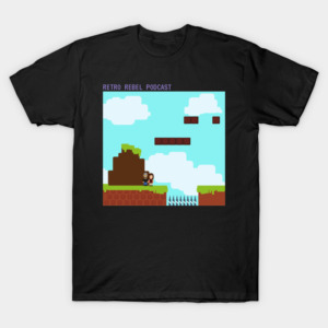 Pixelated Tshirt. The t shirt is black, and has an 8 bit image of Stacy and Amanda as game characters about to jump over a game challenge