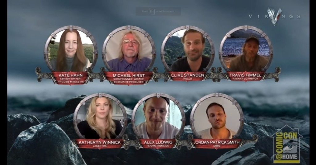 Screen Grab of the Comic Con at home panel. Featured panel guests are seen in headshots with captions that say their name and role on the show. There is a rocky background. 