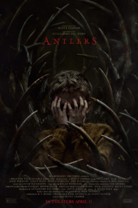 Antlers promotional Poster showing antlers surrounding a scared child who shields his eyes 