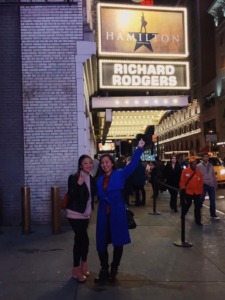 Alice and her friend pose on the street in front of the Richard Rodgers Theater on Broadway. On their way to see Hamilton