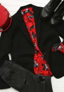 Fun.Com Harley Quinn Blazer pictured nest to a red circle purse, black boots and black jeans