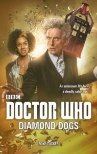 Doctor Who: Diamond Dogs novel cover. The 12th Doctor and Bill Potts are on Saturn and the TARDIS is being taken away by a crane