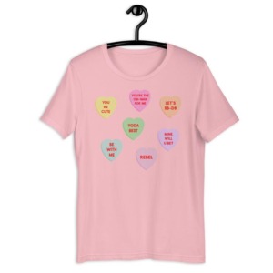 Galentine's Day gift of a pink shirt with multiple colored candy hearts