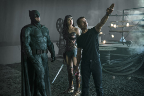 Ben Affleck as Batman, Gal Gadot as Wonder Woman, and director Zack Snyder discussing a scene.