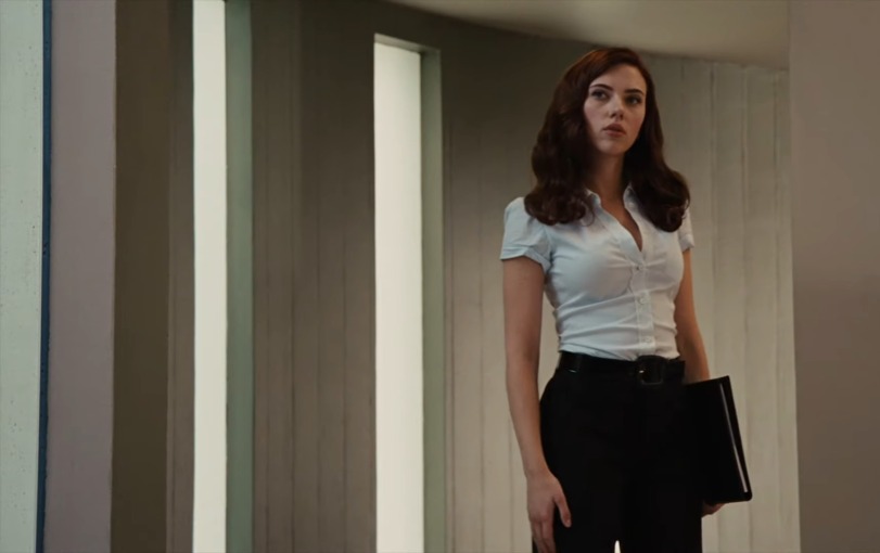 Scarlett Johansson as Natasha Romanoff/Black Widow in Iron Man 2. In her first MCU appearance, Natasha goes undercover as Natalie Rushman, a STARK company employee, to get close to Tony Stark.