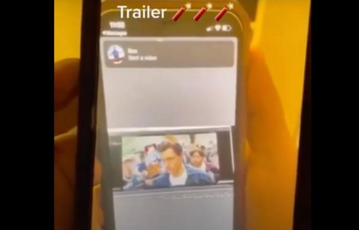 Spider-Man No Way Home leaked photo of someone watching the trailer on a cell phone. The video of the trailer is recorded off of a computer screen. The resolution of the image is very low and it is being shared on social media. 