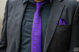 A closeup of a tie and pocket square with a DC Comics Joker suit from Fun.com. 