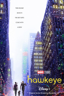 Hawkeye Teaser Poster of Both Lead Characters and Lucky the Pizza Dog walking in a Downtown Area during Christmas Time