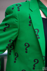 A closeup of question mark details on a DC Comics Riddler suit from Fun.com. 