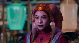 Guya- a new Star Wars character- a Twi'lek with purple skin and two long purple lek'ku or headtails. She has a gold headpiece and a mauve colored outfit