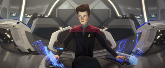 Hologram Janeway sits on the Captain's Chair of The USS Protostar