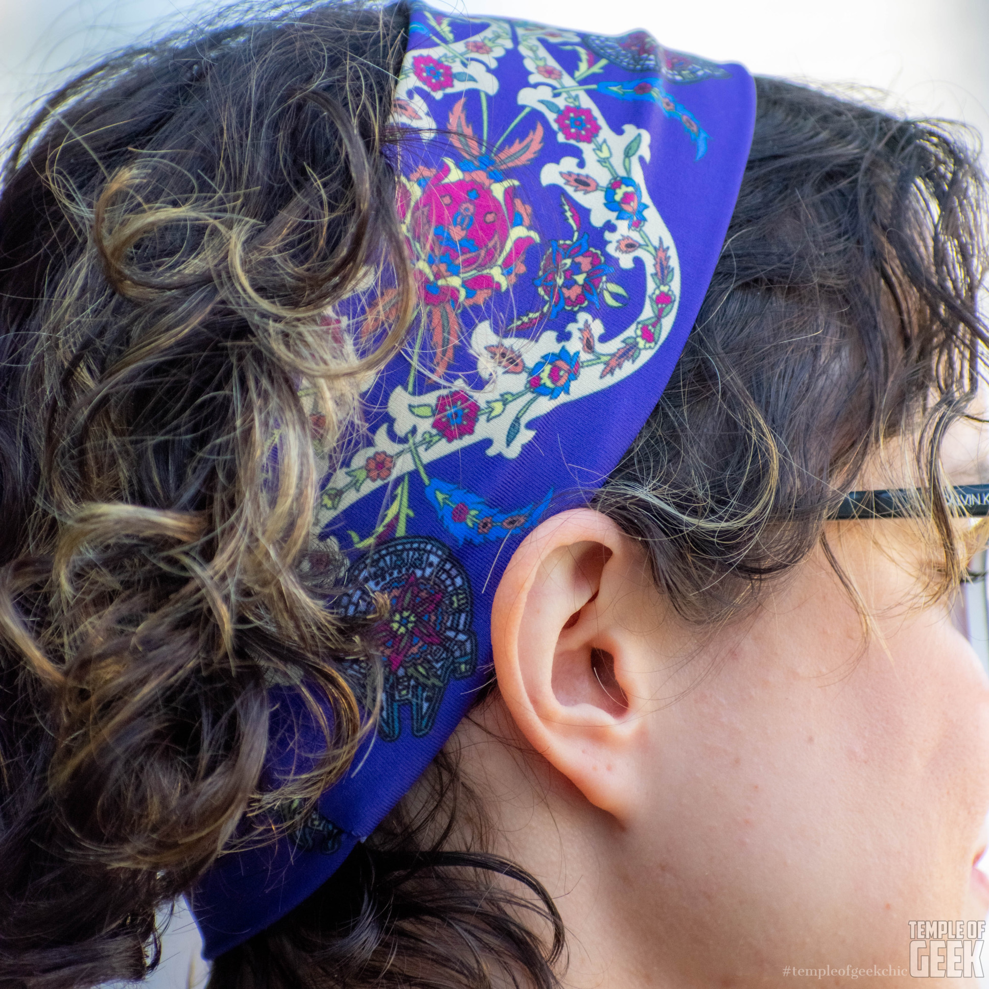 Closeup of a Millennium Falcon print headband by Heroicouture.