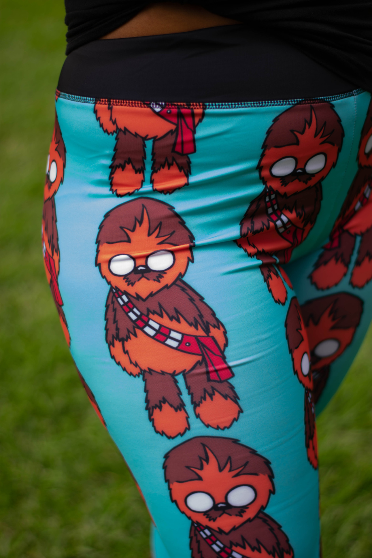 Closeup of leggings with a Chewbacca Star Wars style pattern.