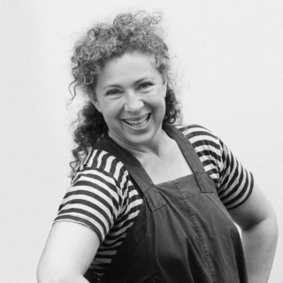 a black and white photo of Alex Kingston