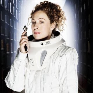 Alex Kingston as River Song in "Silence in the Library", dressed in a white space suit and holding her sonic screwdriver