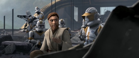 Obi-Wan (wearing his tan Jedi robes), Cody (wearing white Clone Trooper armor with orange accents), and other Clone Troopers of the 212th Battalion take cover during a battle of the Clone Wars