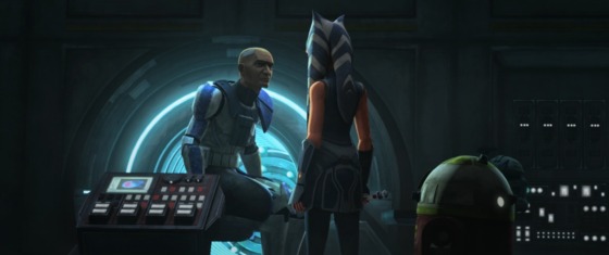 Rex (a Clone trooper with buzz-cut blonde hair wearing Clone Trooper armor with blue detailing) speaks with Ahsoka after she is able to remove the chip from his head