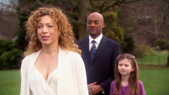 River Song is alive in the world created in the data core of The Library, dressed in all white, with Dr. Moon and Cal looking on as she is reunited with her crew