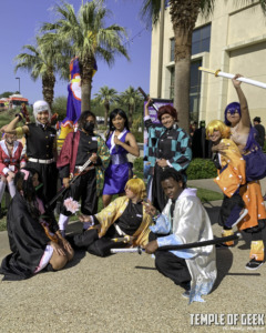 demon slayer cosplayers at anime riverside in front of the riverside convention center