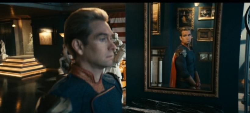 Antony Starr as Homelander  talks to his reflection in a mirror and his reflection responds