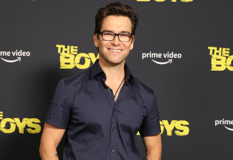 Antony Starr smiles foe the camera and poses for a photo during a Press Day for "The Boys" Season 3