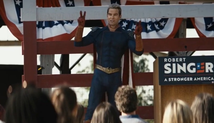 Homelander gives peace signs at a campaign rally 