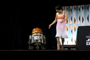 Rosario Dawson on stage at Star Wars Celebration Event with Chopper the droid from Star Wars Rebels