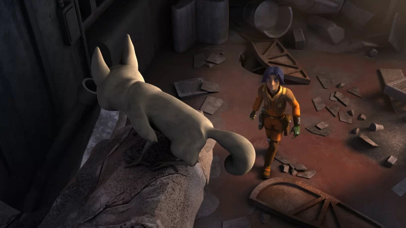 A white loth-cat stands on a cliff above Ezra