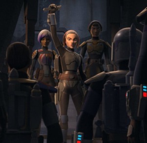 Sabine stands behind Bo-Katan who wields the Darksaber