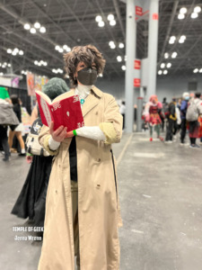 Dazai cosplayer from the anime Bungo Stray Dogs. AnimeNYC cosplay