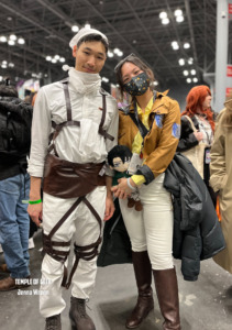 Levi Ackerman and Zoe Hange cosplayers from the anime Attack on Titan. AnimeNYC cosplay