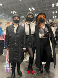 Akutagawa, Yosano, and Chuuya cosplayers from the anime Bungo Stray Dogs. AnimeNYC cosplay