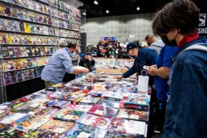 A comic book exhibitor displays rows and rows of comic books at LA Comic Con. 