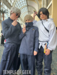 Satoru Gojo, Toge Inumaki, and Yuta Okkotsu cosplayers at Anime Los Angeles