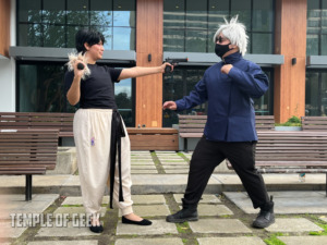 Toji Fushiguro and Satoru Gojo cosplayers at the Jujutsu Kaisen on day 3 meetup at Anime LA