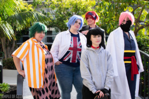 Sk8 the Infinity cosplay group at Gallifrey One posing in front of Palm trees