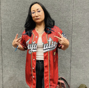 Anne Yatco poses in a Jujutus Kaisen jersey