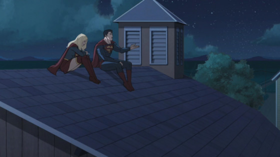 Superman and Supergirl sit on the roof of the Kent farm's barn