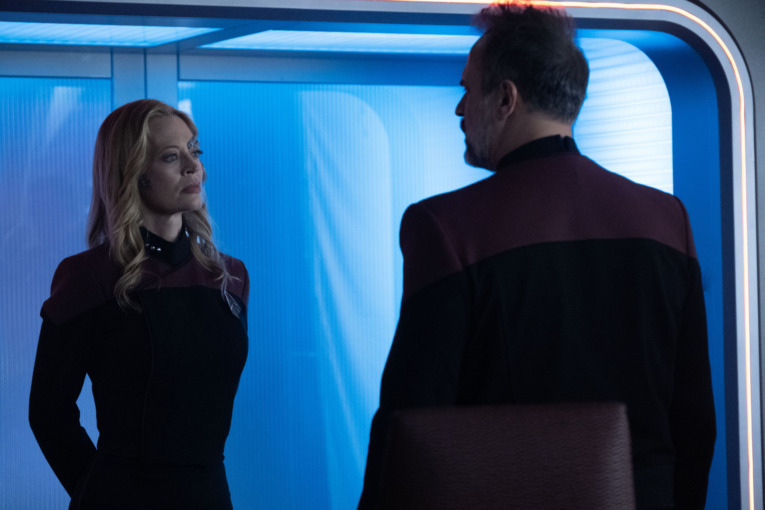 Jeri Ryan (as Seven) confronting Captain Shaw (played by Todd Stashwick) 